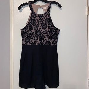 NWT Black romper with lace stretch top open back